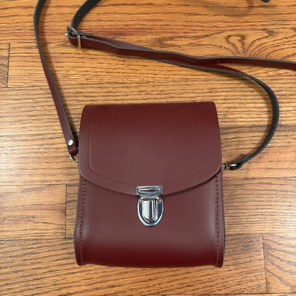 The Cambridge Satchel Company Mini Push Lock crossbody. Oxblood.